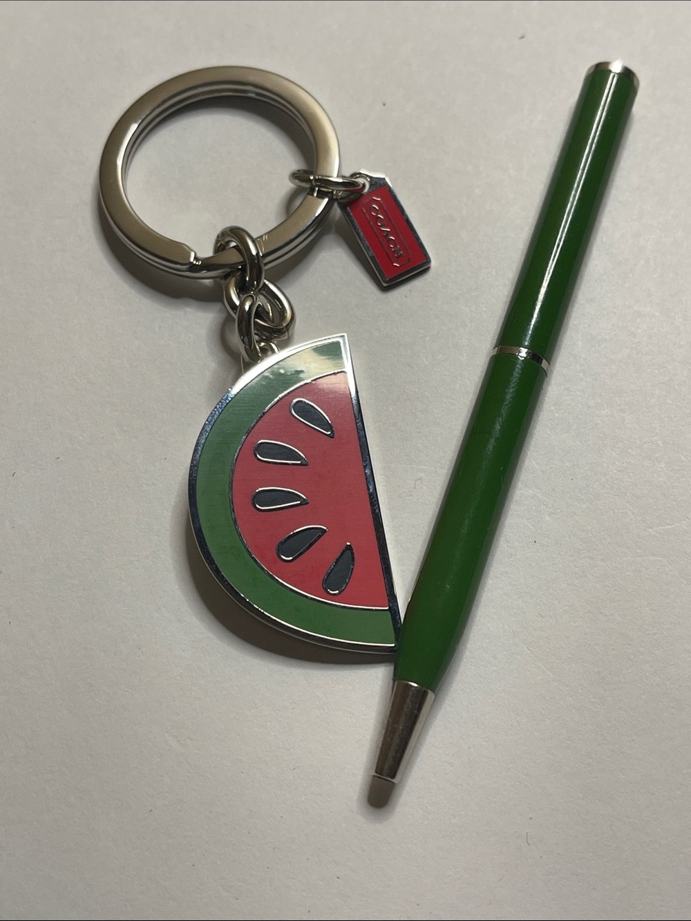 Coach Watermelon Slice Keychain in Pink & Green and Coach Pen